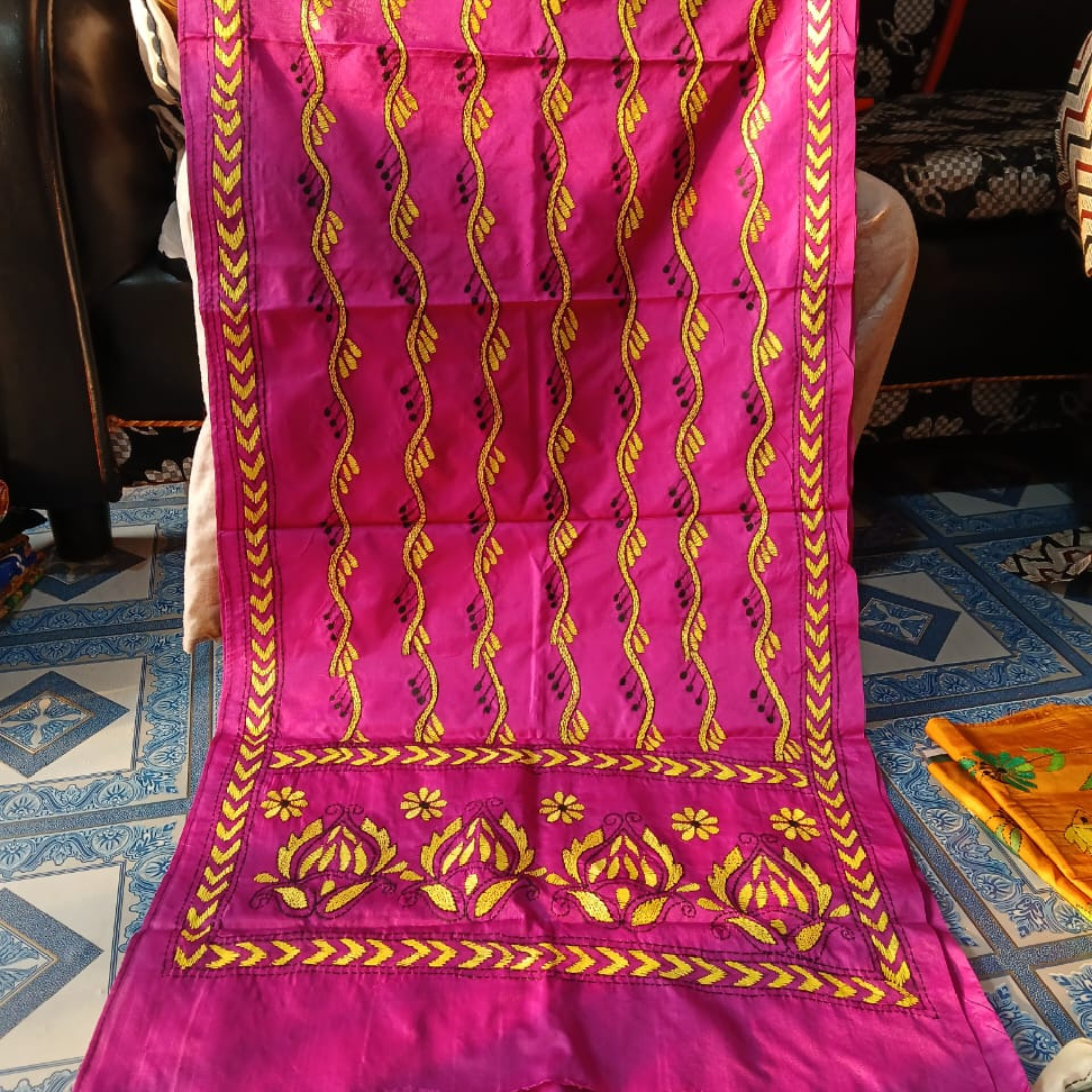 Magenta silk stole with vibrant yellow lotus and vine hand embroidery, ideal for festive and ethnic outfits.