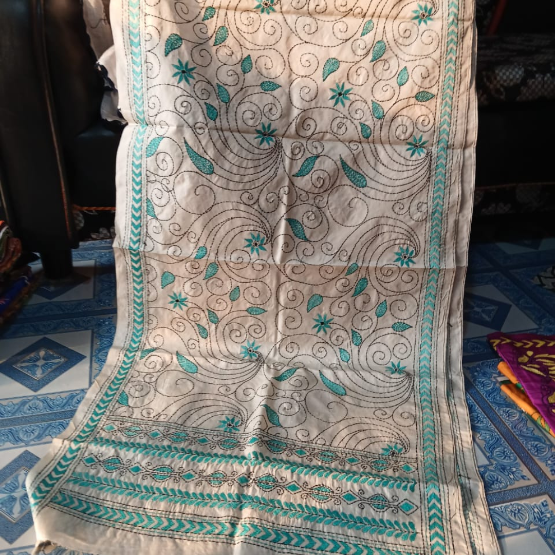 White Tussar silk stole with intricate floral pattern.