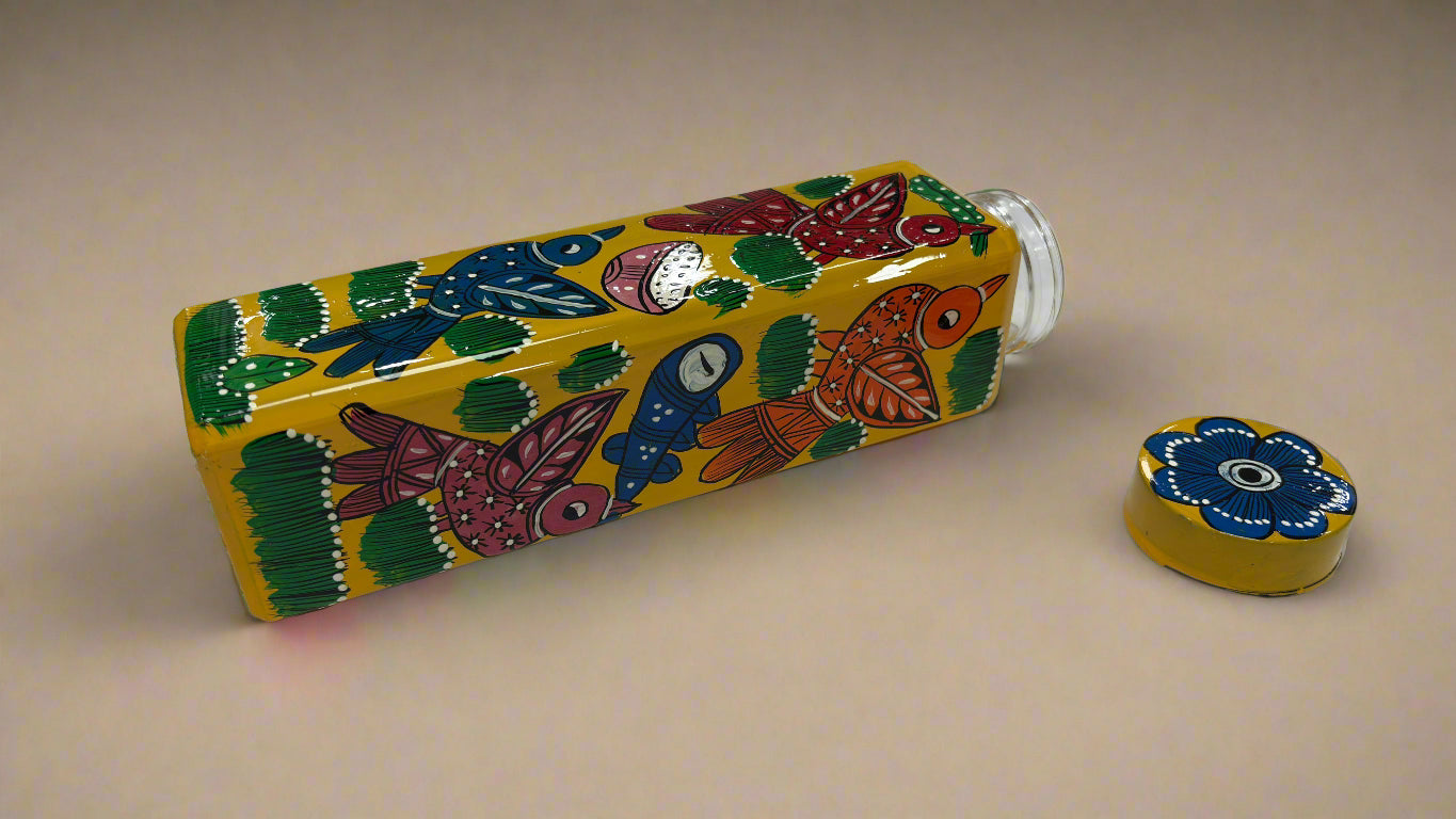 Colorful water bottle with artistic design on a white surface