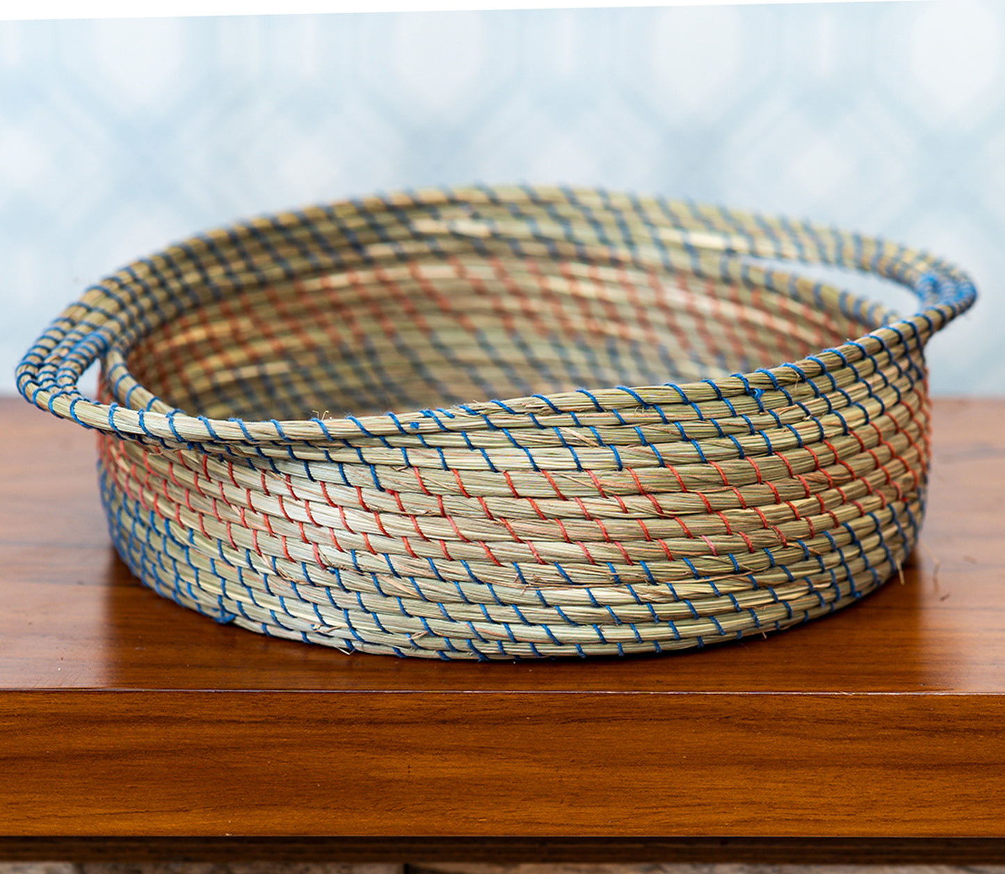 Round Basket of Sabai Grass with Blue and Red Thread Work - ArtisanSoul