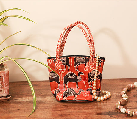 Embossed Leather Potli Bag for Women from Birbhum - Camel on Brown - ArtisanSoul