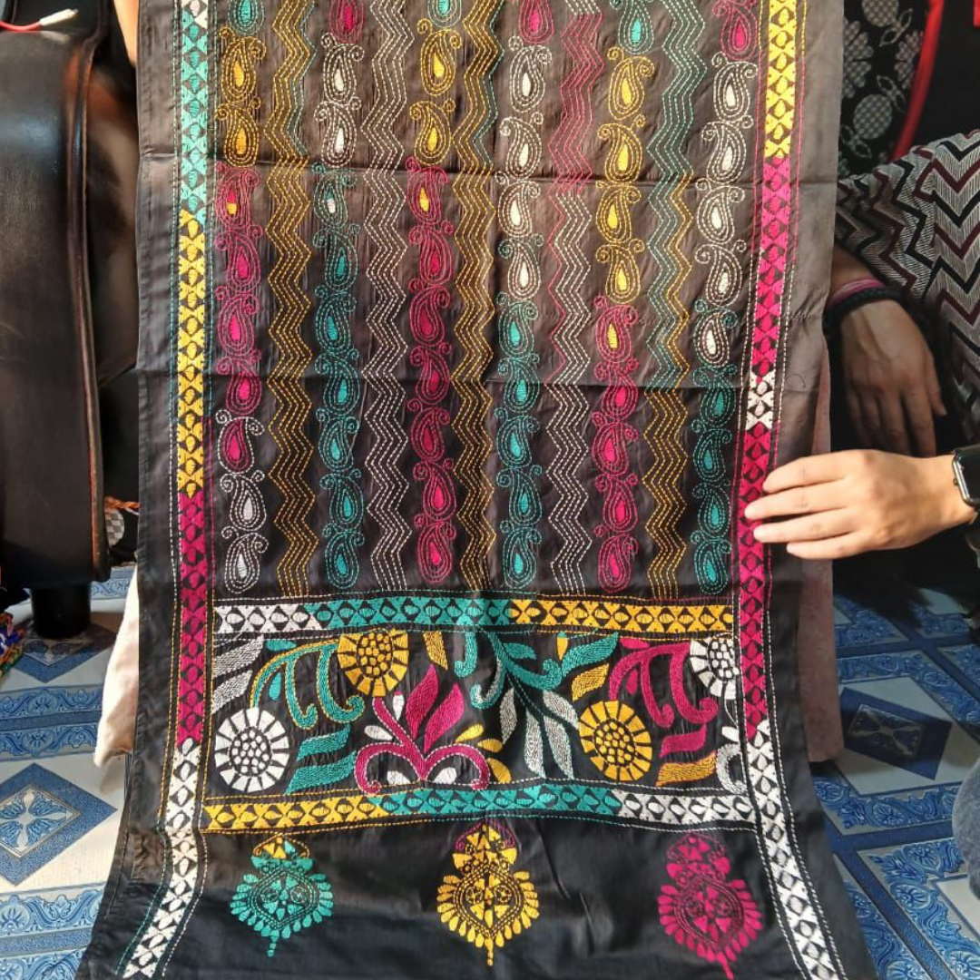 Black stole with colorful embroidery.