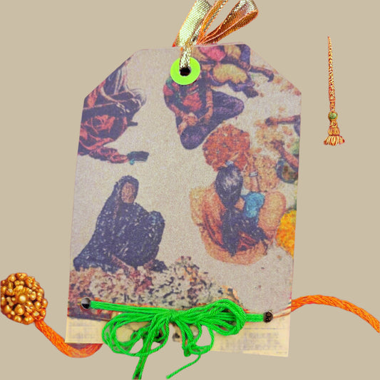 Decorative string with a colorful tag featuring people and a gold tassel on a beige background