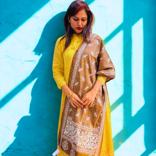 An Indian woman wearing a handcrafted kantha stole