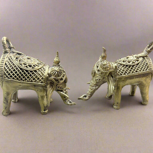 Pair of Jaali-style handcrafted brass elephants in traditional Dokra tribal art from Bengal