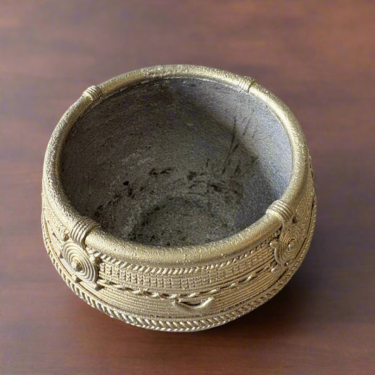Handcrafted Dokra brass measuring bowl with tribal motifs, made in Odisha, India