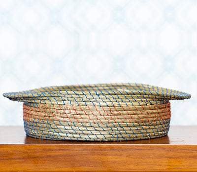 Round Basket of Sabai Grass with Blue and Red Thread Work